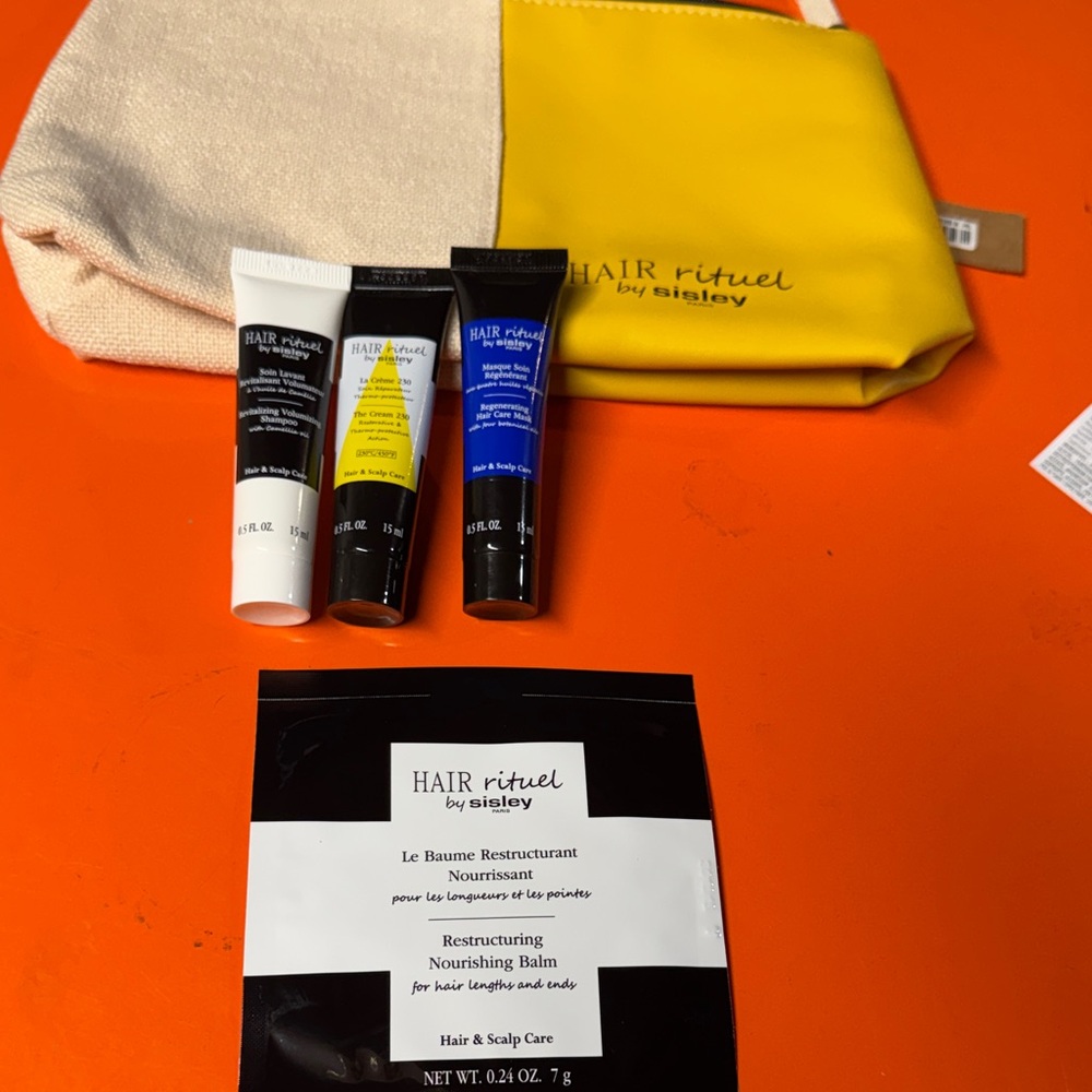 Sisley Hair Care Collection with Yellow and Blue Accents